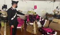 Dipendenti in nero all'opera per produrre vestiti contraffatti, imprenditore di Borgo Mantovano nei guai